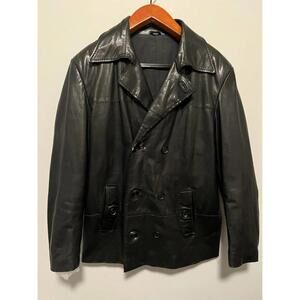 Well, worn black double breasted   leather jacket